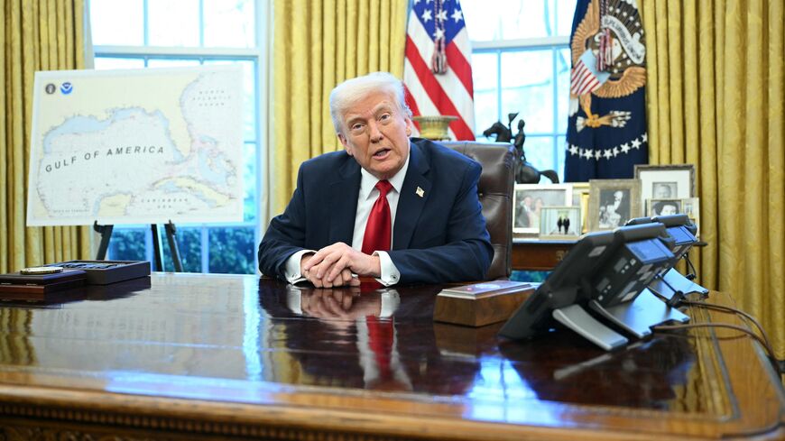 US President Donald Trump announces tariffs on auto imports in the Oval Office of the White House in Washington, on March 26, 2025.