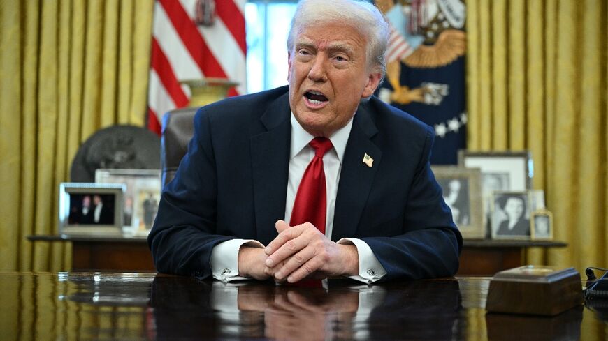 Trump spoke to reporters in the Oval Office after signing an order to enact sweeping tariffs on car imports