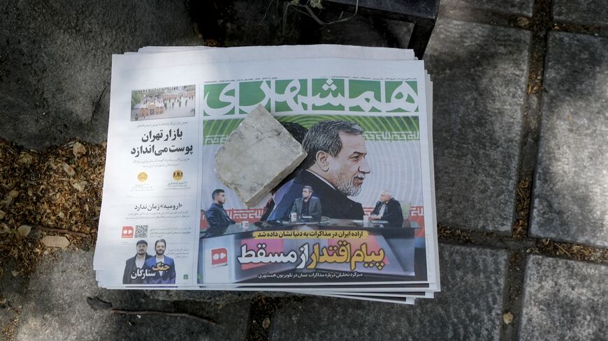 The front page of Iran's newspapers in a sidewalk newsstand in Tehran, Iran, on April 13, 2025.