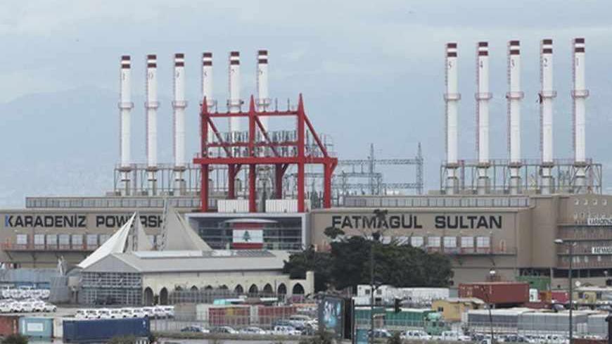 Turkish Karadeniz Powership Fatmagul Sultan, an electricity-generating ship, is seen docked at Beirut port February 18, 2013. A member of Karadeniz Holding's powership fleet, Karadeniz Powership Fatmagul Sultan, departed from Istanbul on February 8 to Beirut to supply electricity to Lebanon. REUTERS/Mohamed Azakir   (LEBANON - Tags: ENERGY BUSINESS POLITICS) - RTR3DY6T