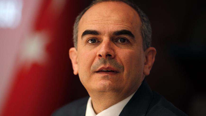 Turkey's central bank governor Erdem Basci addresses the general assembly of the bank in Ankara April 17, 2014. Turkey's current account deficit to gross domestic product (GDP) ratio was expected to be between 5-6 percent at the end of 2014, Basci said on Thursday.   REUTERS/Umit Bektas (TURKEY - Tags: POLITICS BUSINESS HEADSHOT) - RTR3LO49