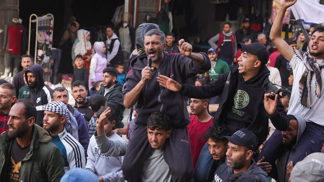 Palestinians attend a rally calling for an end to the war, in Beit Lahia, in the northern Gaza Strip, on March 25, 2025.