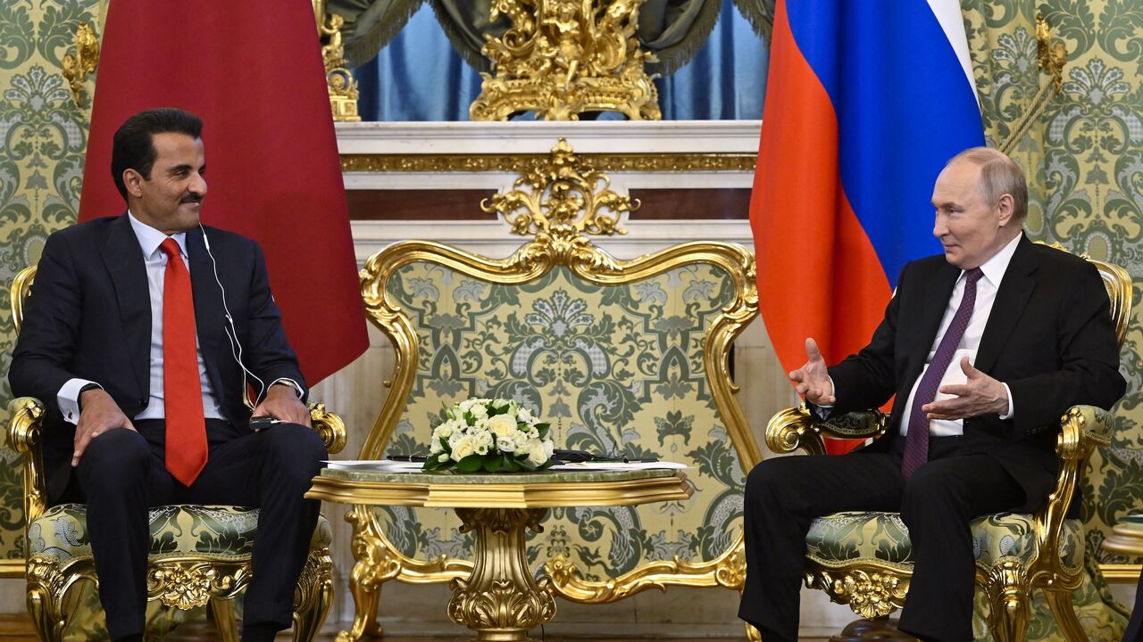 Russian President Vladimir Putin meets with Qatar's Emir Sheikh Tamim bin Hamad al-Thani at the Kremlin in Moscow, on April 17, 2025.