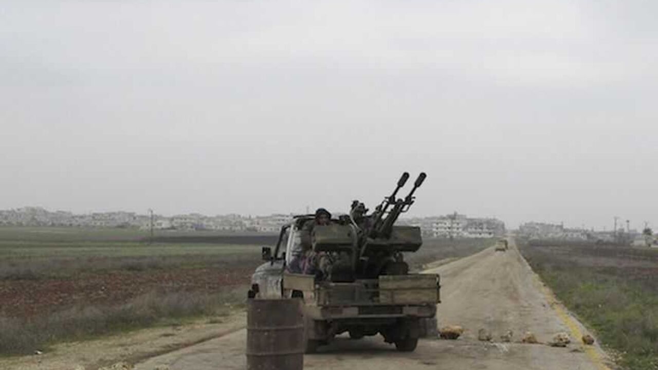 Fighters from the Islamist Syrian rebel group Jabhat al-Nusra sit in their tank near Taftanaz military airport Fighters from the Islamist Syrian rebel group Jabhat al-Nusra sit in their tank near Taftanaz military airport January 12, 2013. Picture taken January 12, 2013.REUTERS/Abdalghne Karoof (SYRIA - Tags: CIVIL UNREST MILITARY POLITICS CONFLICT) - RTR3CFWU