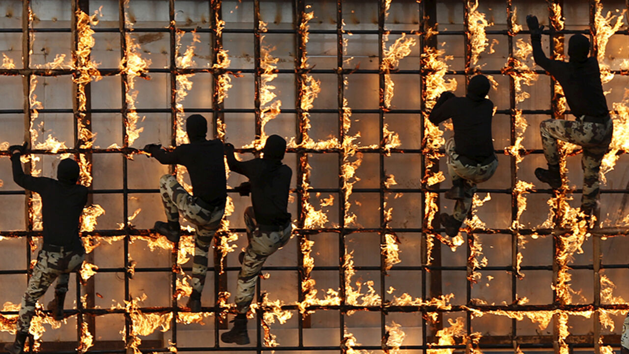 SAUDI ARABIA-RELIGION Members of Saudi security forces take part in a military parade in preparation for the annual Haj pilgrimage in the holy city of Mecca September 17, 2015. REUTERS/Ahmad Masood TPX IMAGES OF THE DAY - RTS1M2W