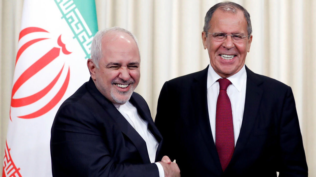 RUSSIA-IRAN/ Russia's Foreign Minister Sergei Lavrov and his Iran's counterpart Javad Zarif shake hands after a news conference following their meeting in Moscow, Russia, September 2, 2019. REUTERS/Evgenia Novozhenina? - RC1701538170